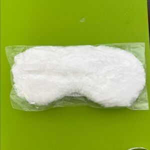 Fluffy white sleep mask